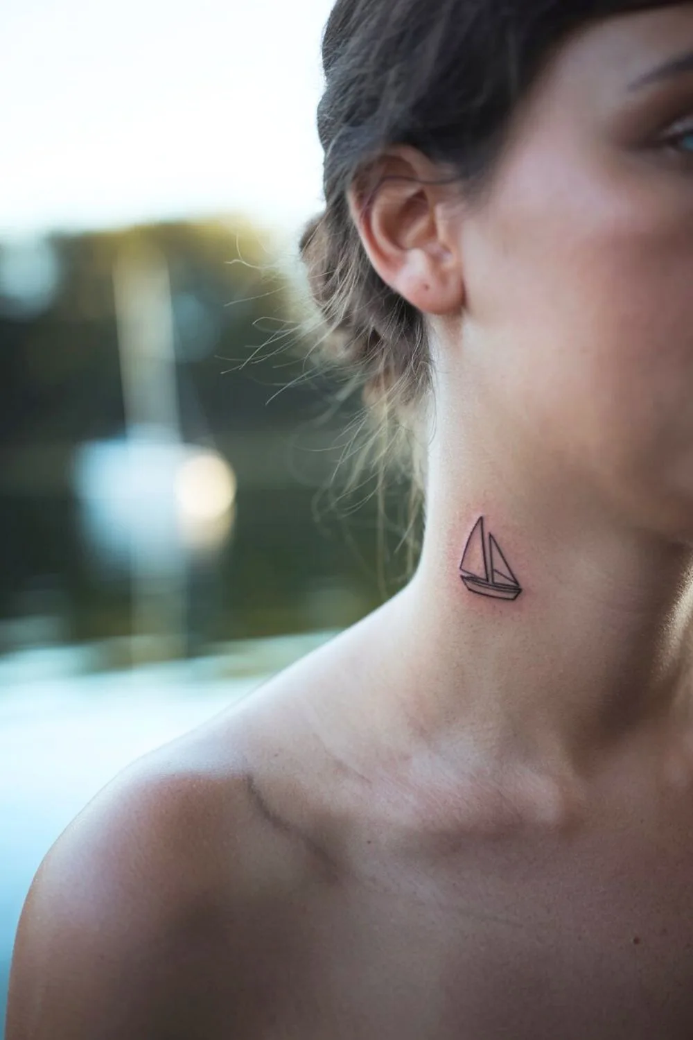 Neck Travel Tattoo 2