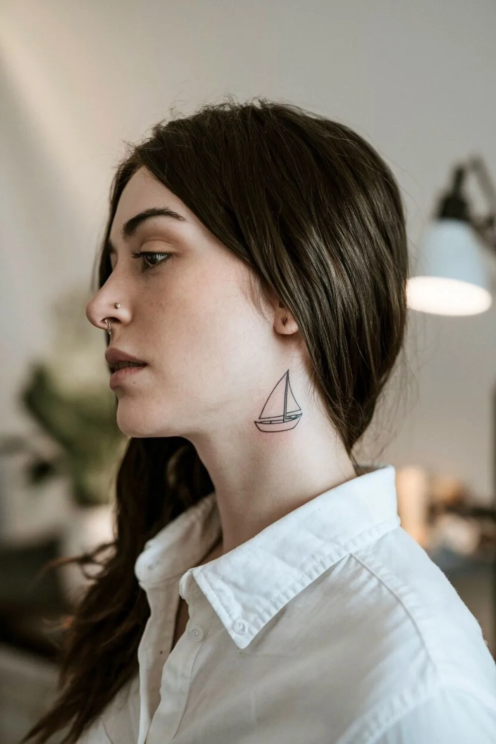 Neck Travel Tattoo 3