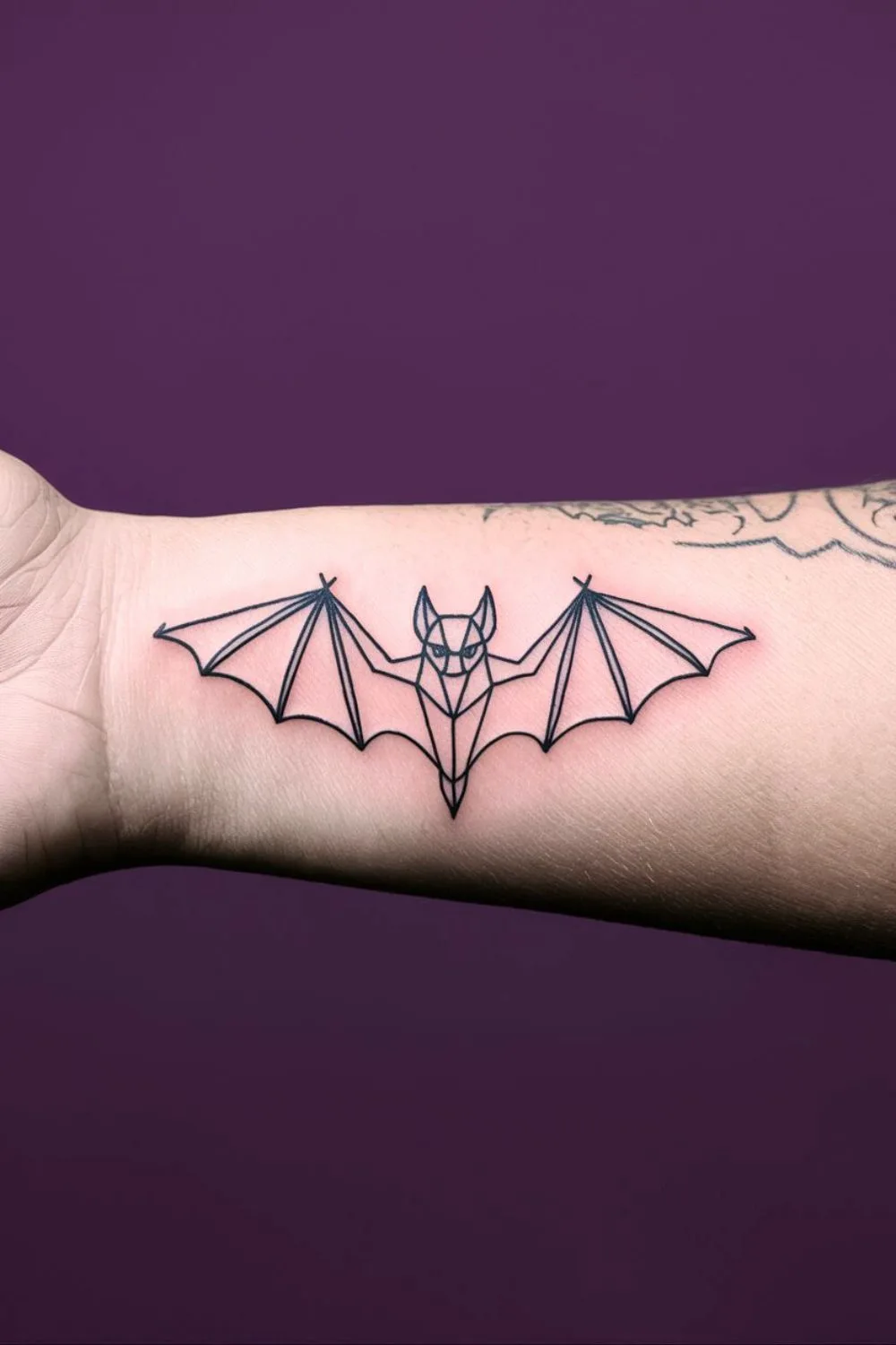 Simple Goth Bat Tattoo 5