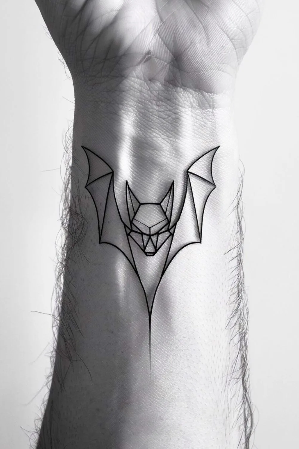 Simple Goth Bat Tattoo 7